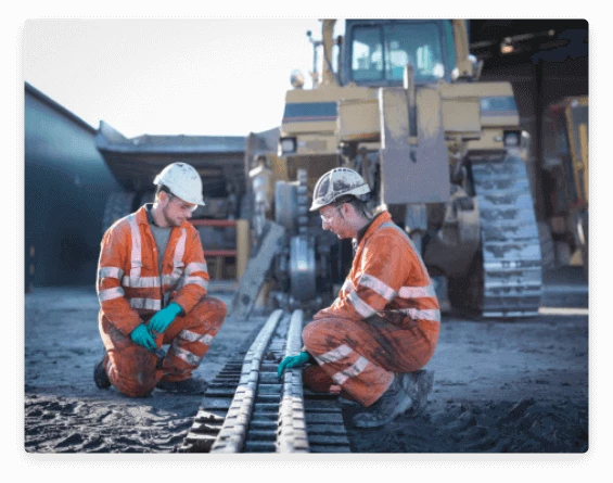 Contruction Maintenance crew repairing equipment